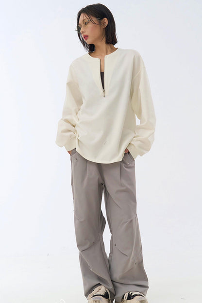 Relaxed pants fit pleated leg