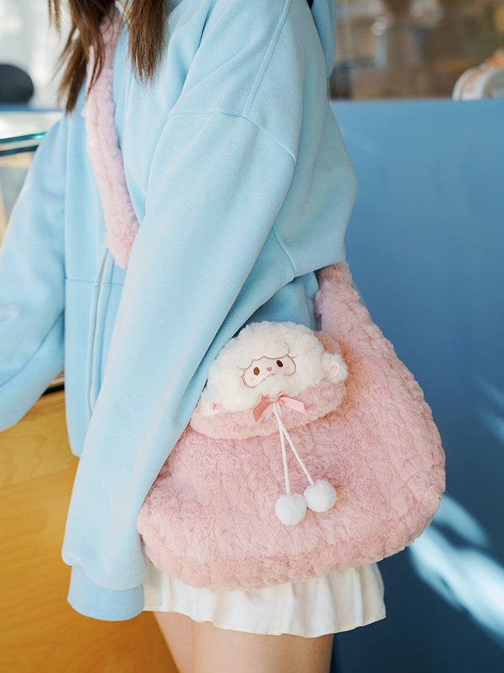 Sac bandoulière en peluche rose avec pompons et petit agneau mignon