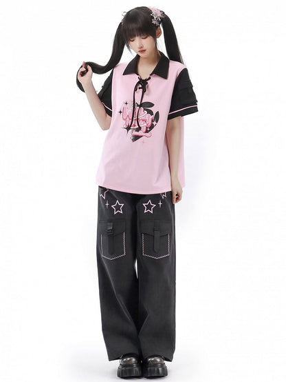 Schwarzes T-Shirt mit rosa Details und Schnürgrafik