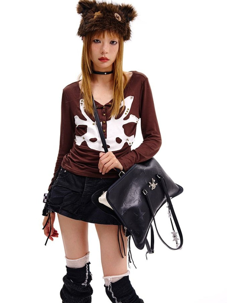 Kissenförmige Umhängetasche in Beige/Schwarz mit Sternriemen