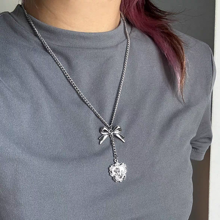 Silver Bow Pendant Necklace