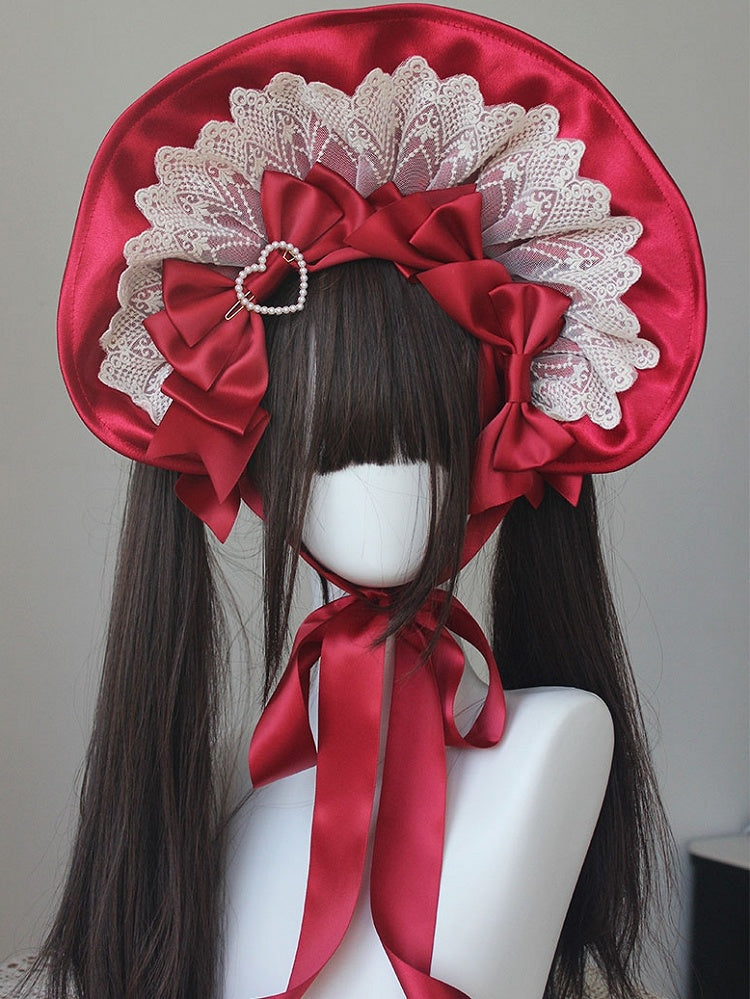 Bonnet à bordure en dentelle et nœud décoratif orné de perles