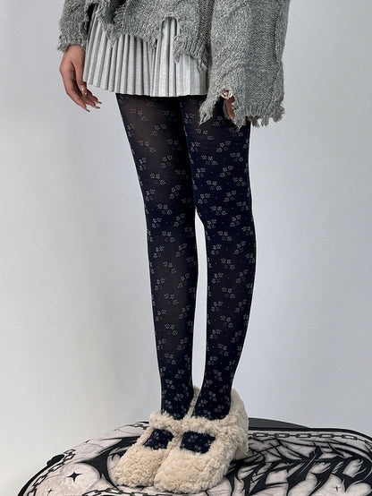 Dunkelblaue Strumpfhose mit Blumenmuster