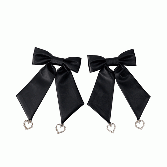 Rockclips mit Schleife und Herzanhänger in Schwarz