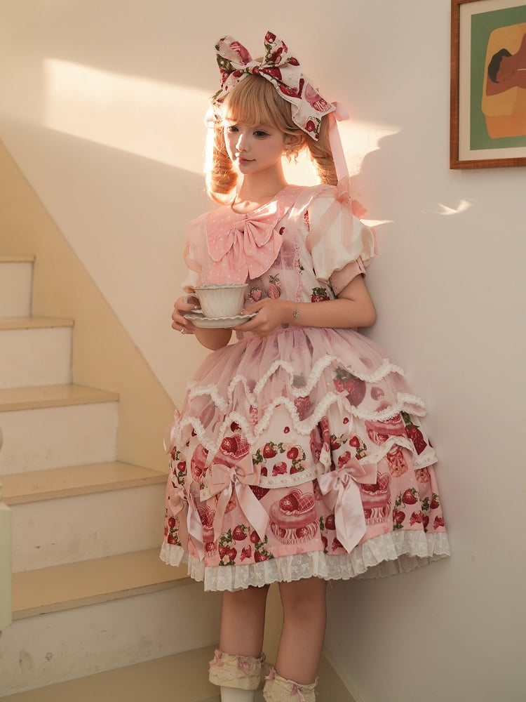 Ensemble complet Lolita une pièce rose à imprimé fraise et col Peter Pan