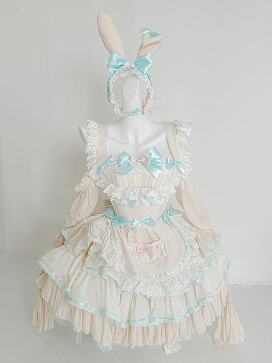 Robe bouffante sans bretelles à volants et taille basque avec tablier rose et vert menthe