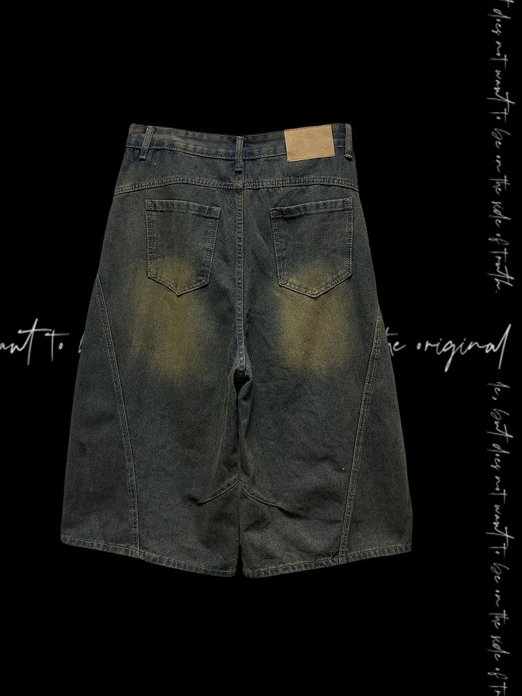 Dunkelblaue Jeans mit weitem Bein, verblasste Waschung, Kreuzapplikationen, Distressed