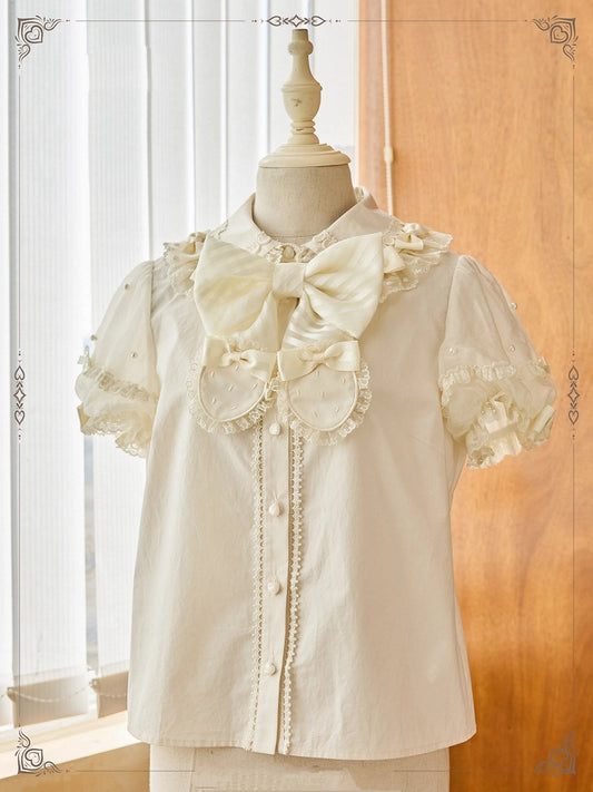 Beige Bluse mit abnehmbarem Schleifenausschnitt, Perlen und kurzen Puffärmeln