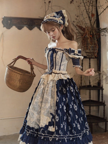 Blaues Cabins-Korsett-Oberteil mit offenen Schultern + dunkelblauer Lolita-Rock mit Blumenmuster