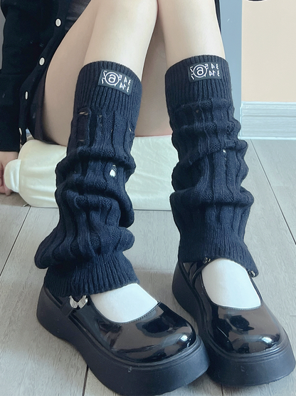 Jambières tricotées blanc cassé/noir