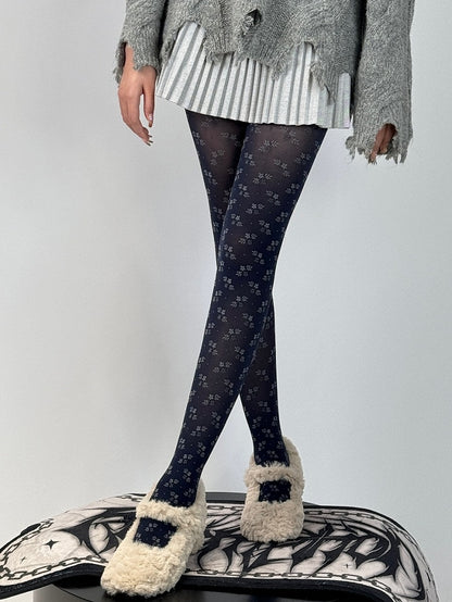 Dunkelblaue Strumpfhose mit Blumenmuster