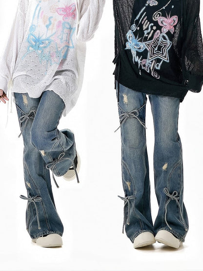 Bow Accents Flared Jeans Blue Faded Wash Distressed Holes Light