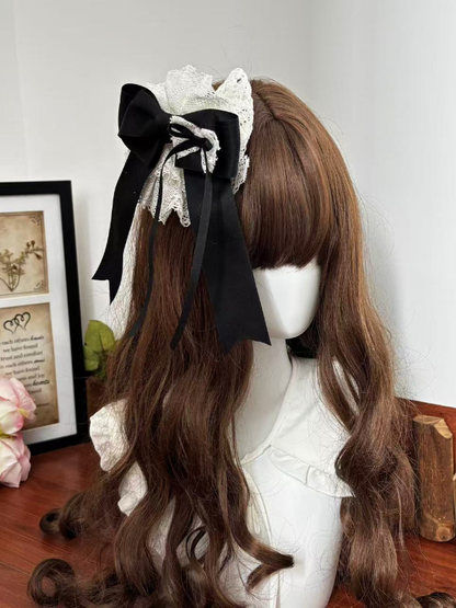 Barrette à cheveux florale blanche / noire et blanche
