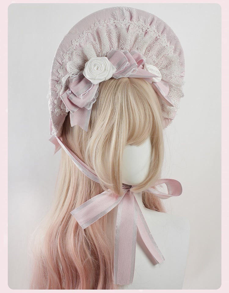 Bonnet Lolita rose à gros nœud et bordure en dentelle florale à volants
