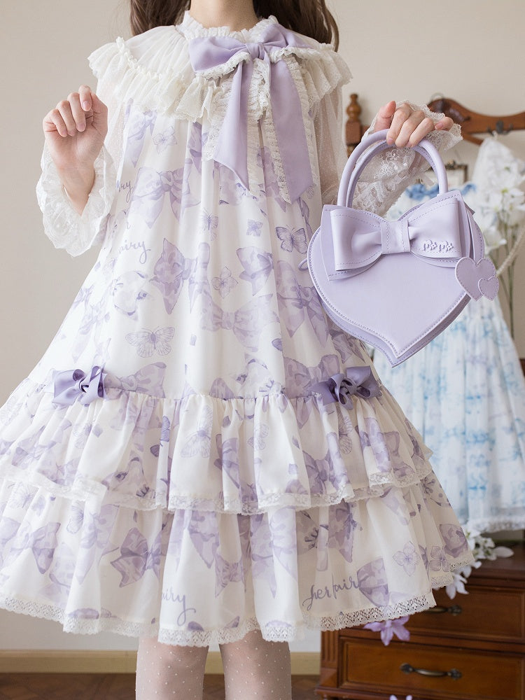 Robe Lolita violette à gros nœud sur le décolleté et imprimé nœuds double épaisseur