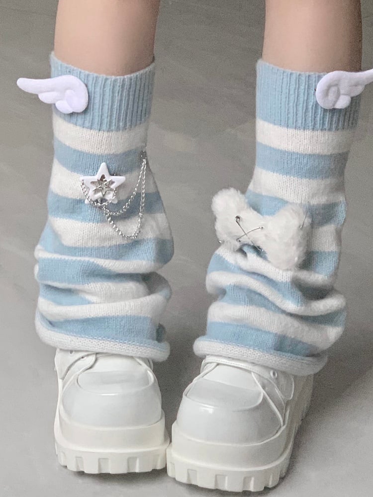 Jambières à rayures bleues et noires avec motif d'ailes et peluche en forme d'os