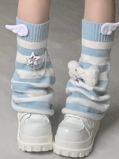 Jambières à rayures bleues et noires avec motif d'ailes et peluche en forme d'os