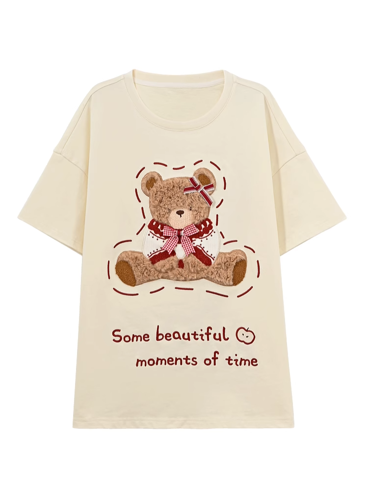 Aprikosenfarbenes, lockeres T-Shirt mit Rundhalsausschnitt und Bärenstickerei aus Baumwollplüsch