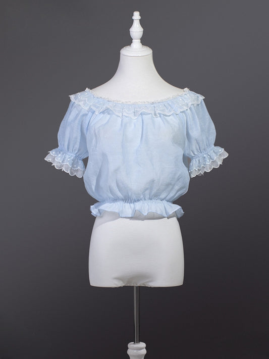 Hellblaue Chiffonbluse mit kurzen Puffärmeln