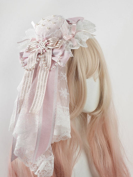 Mini chapeau rose à gros nœud en dentelle et chaîne perlée avec flocon de neige + voile en dentelle flocon de neige