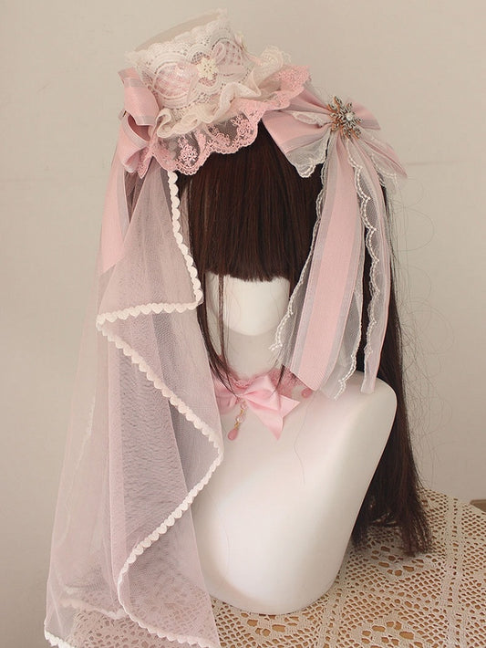 Chapeau haut-de-forme rose de Noël avec nœud en dentelle et voile
