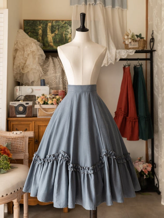 Jupe Lolita mi-longue bleu poudré à volants et ourlet à volants