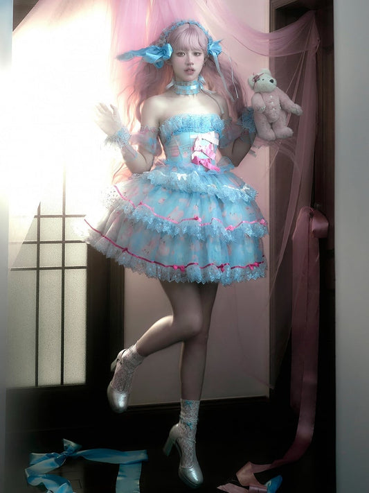 Robe bleue à armatures avec jupe à volants décorée de nœuds en satin et de lapin mignon