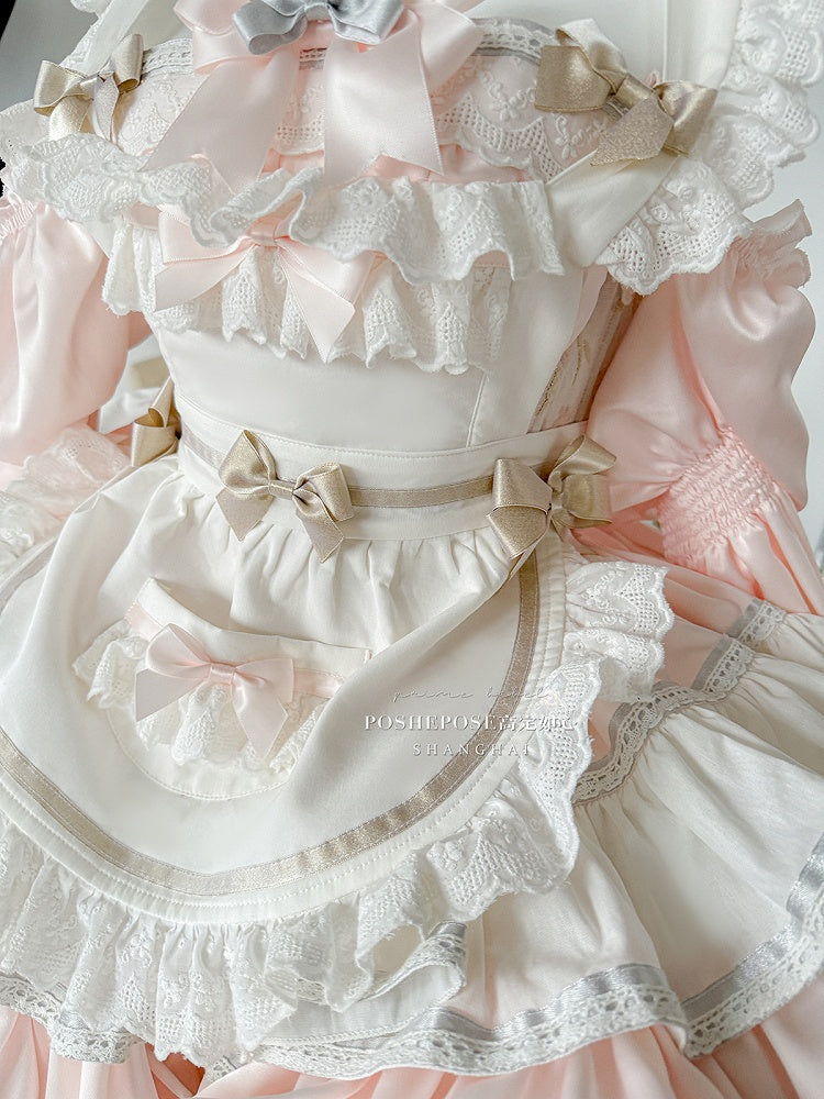 Robe bouffante sans bretelles à volants et taille basque, tablier blanc et rose