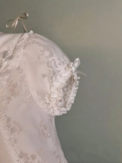 Pan – Peter-Bluse mit weißem Kragen und Puffärmeln