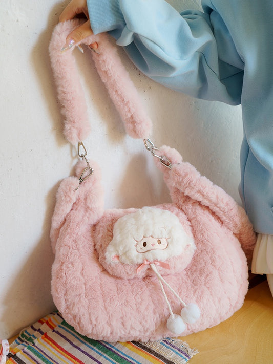 Sac bandoulière en peluche rose avec pompons et petit agneau mignon
