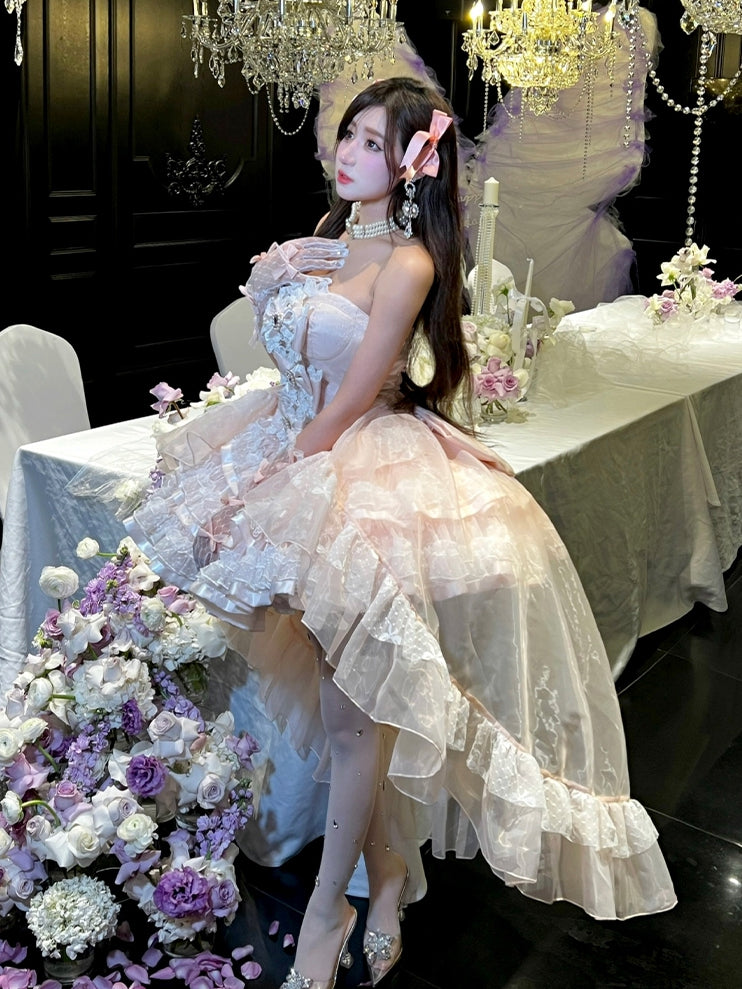Robe bustier princesse d'anniversaire avec corsage décoré de nœuds roses et jupe superposée