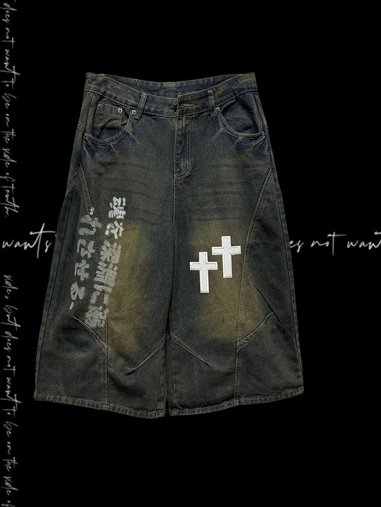 Dunkelblaue Jeans mit weitem Bein, verblasste Waschung, Kreuzapplikationen, Distressed