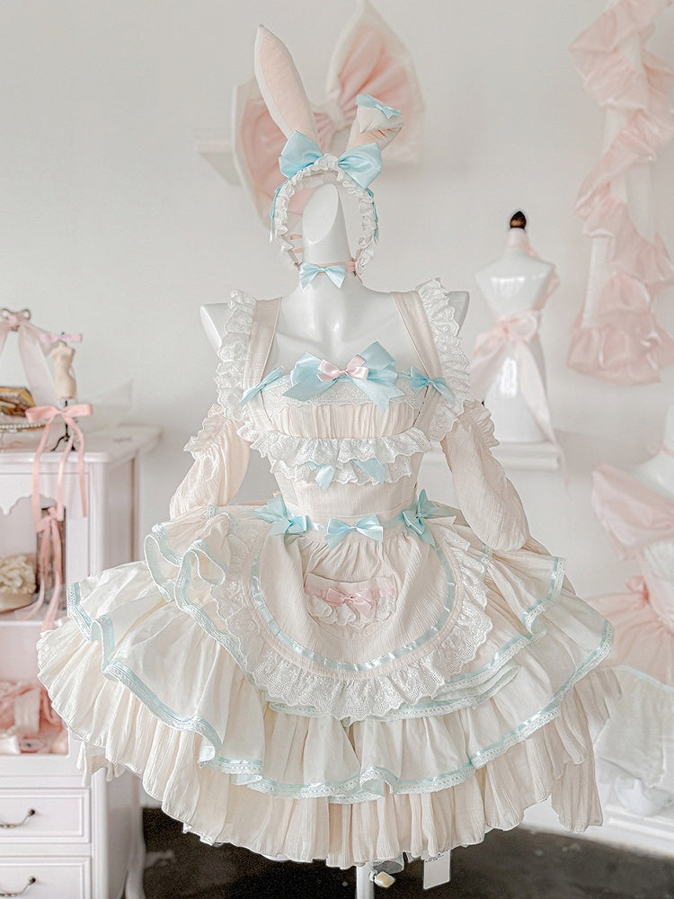 Robe bouffante sans bretelles à volants et taille basque avec tablier rose et vert menthe