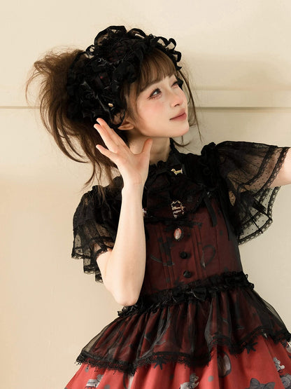 Bandeau à nœuds noirs et rouges