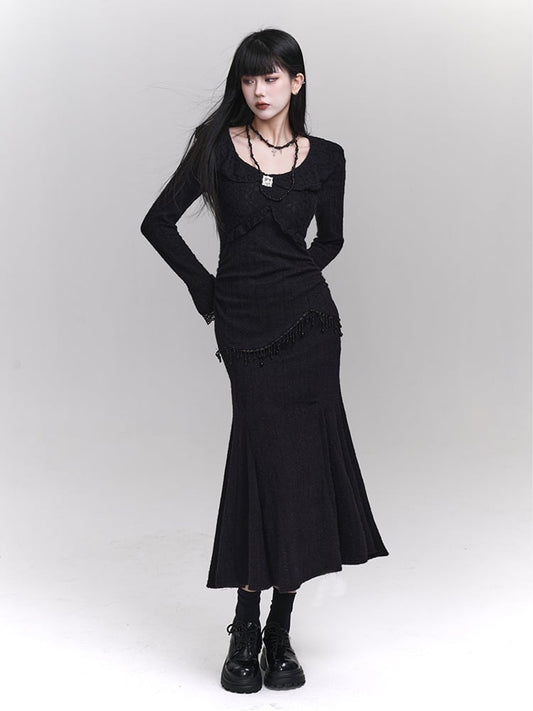 Robe sirène noire ajustée à col rond et détails en perles