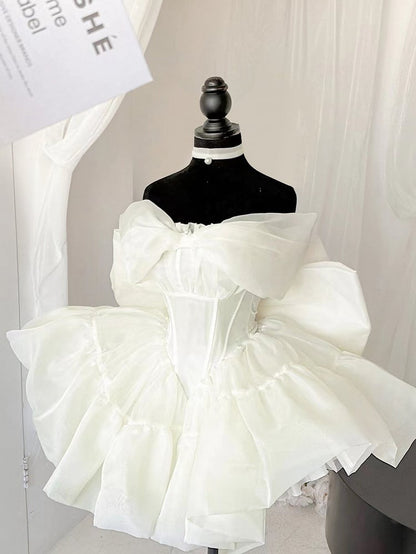 Robe d'anniversaire princesse jaune clair à taille basque et gros nœud