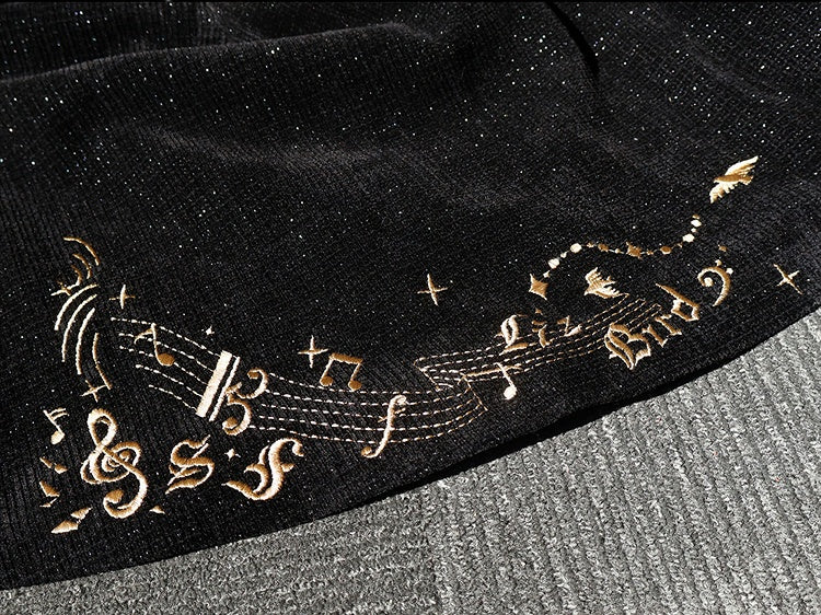 Black Ouji Glittering Waffle Top with Music Notes and Fringe Sash