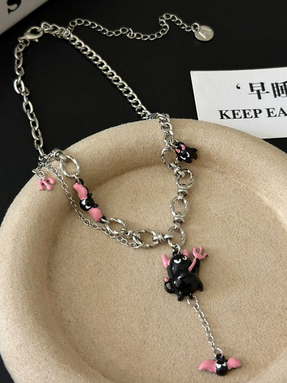 Collier pendentif petit diable rose/orange Y2K