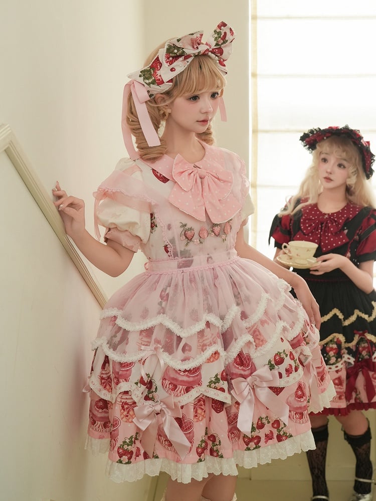 Ensemble complet Lolita une pièce rose à imprimé fraise et col Peter Pan