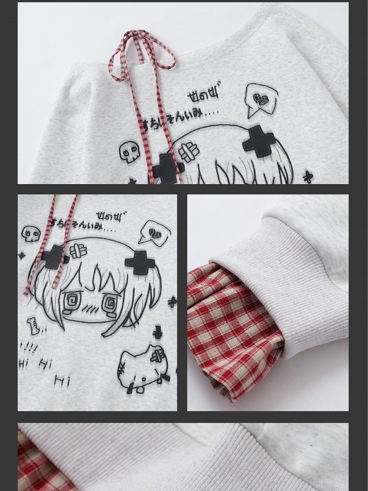 Haut Yami Kawaii noir/blanc à encolure asymétrique et poignets à carreaux