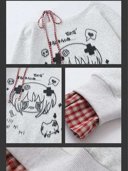 Haut Yami Kawaii noir/blanc à encolure asymétrique et poignets à carreaux