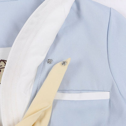 Blaues Top mit Matrosenkragen und kleinem Huhn